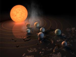 Ilustración de la estrella TRAPPIST-1 y sus planetas. / NASA/JPL-Caltech